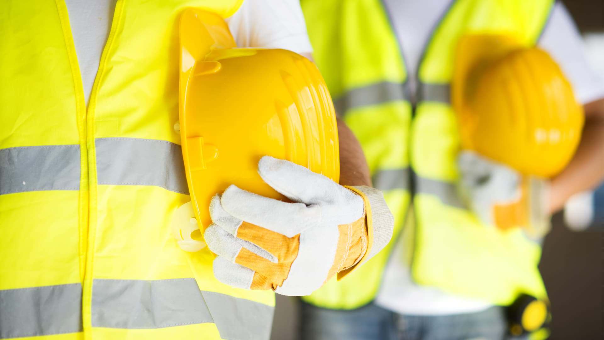 Link Resources emergency response skill set workers wearing PPE holding hard hats for safety readiness