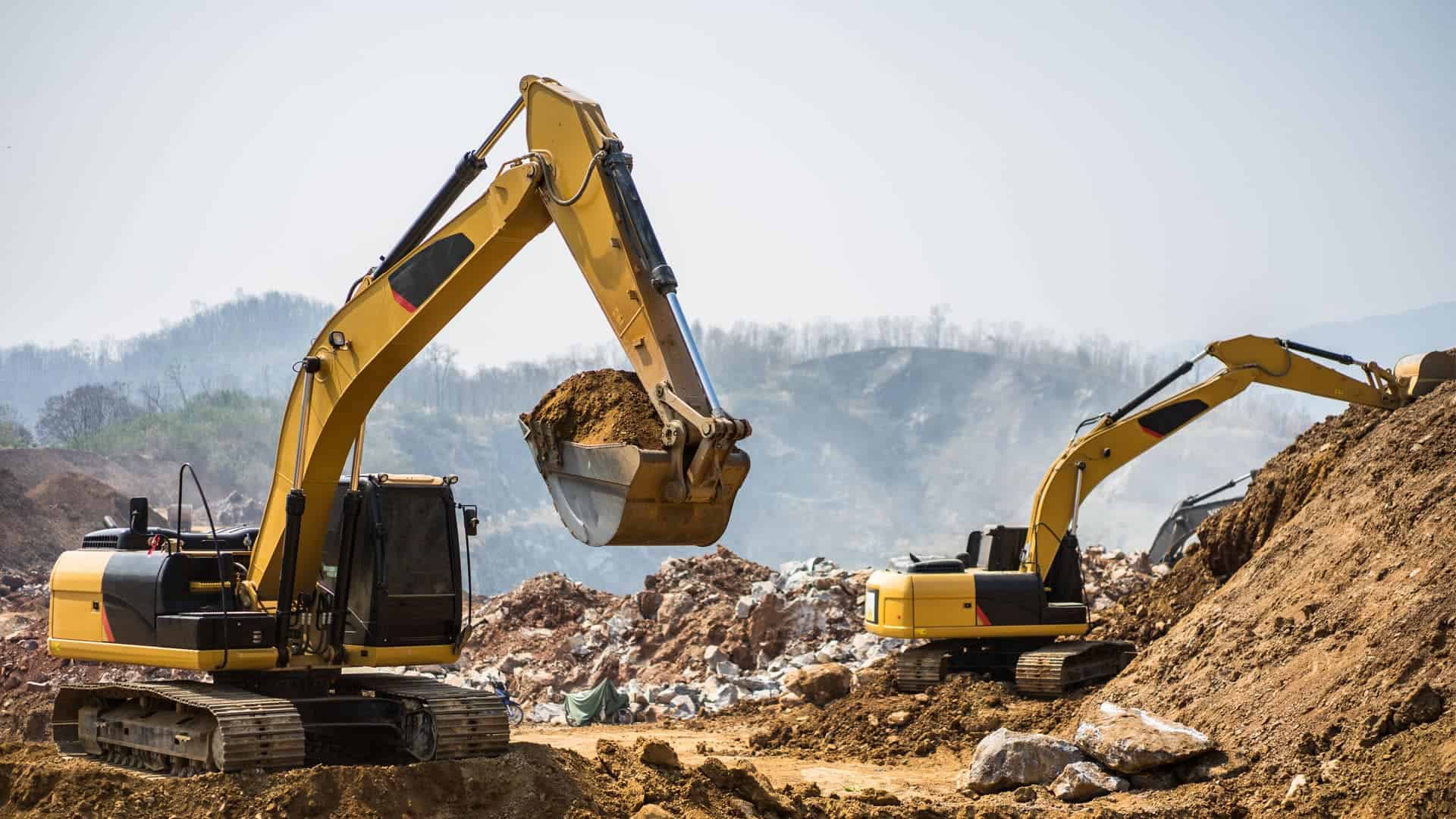 Link Resources excavator operations training excavators digging and loading soil on construction site