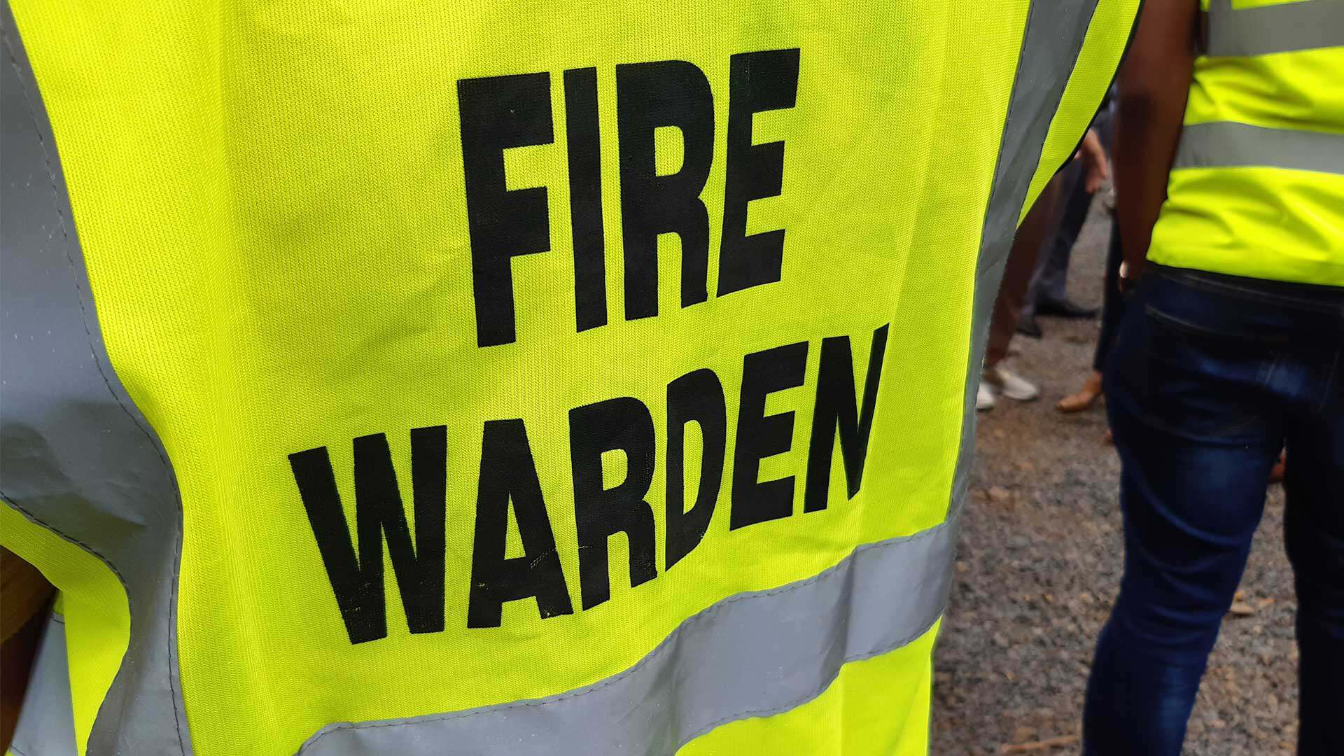 Link Resources fire warden wearing high visibility vest during workplace emergency response training